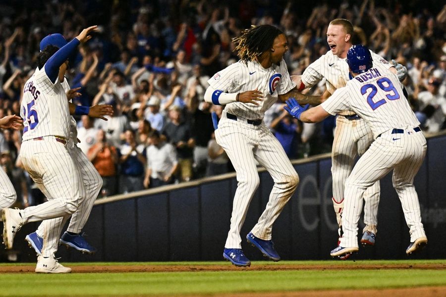 MLB roundup: Cubs rally for 4 in ninth inning, stun A's