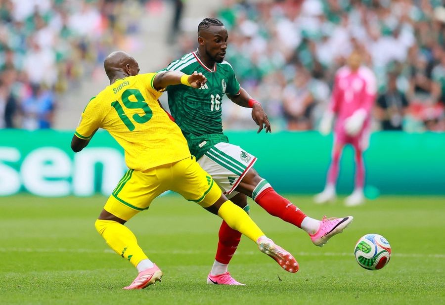 Mexico kick off World Cup with 2-0 win over 9-man South Africa