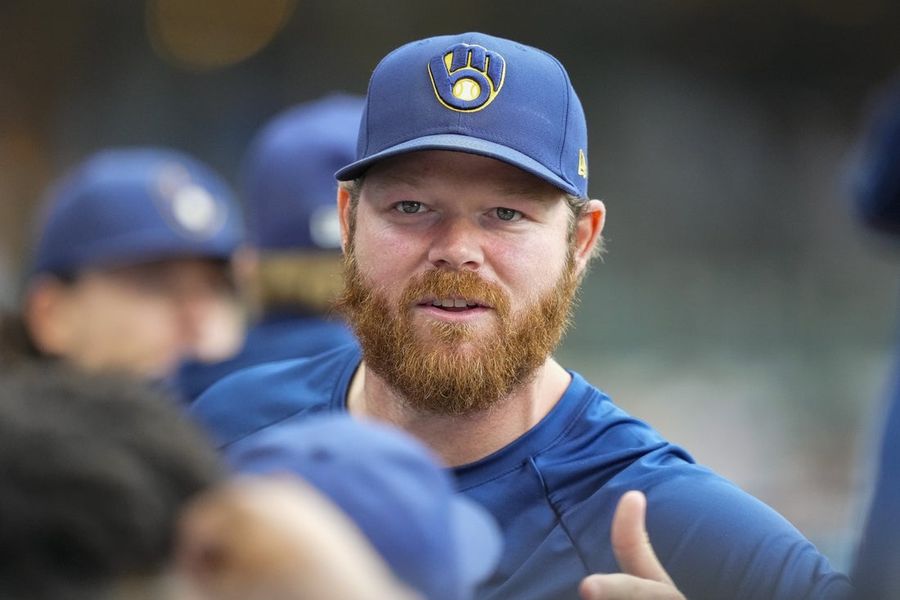 Brandon Woodruff shines in return as Brewers edge Reds in 10