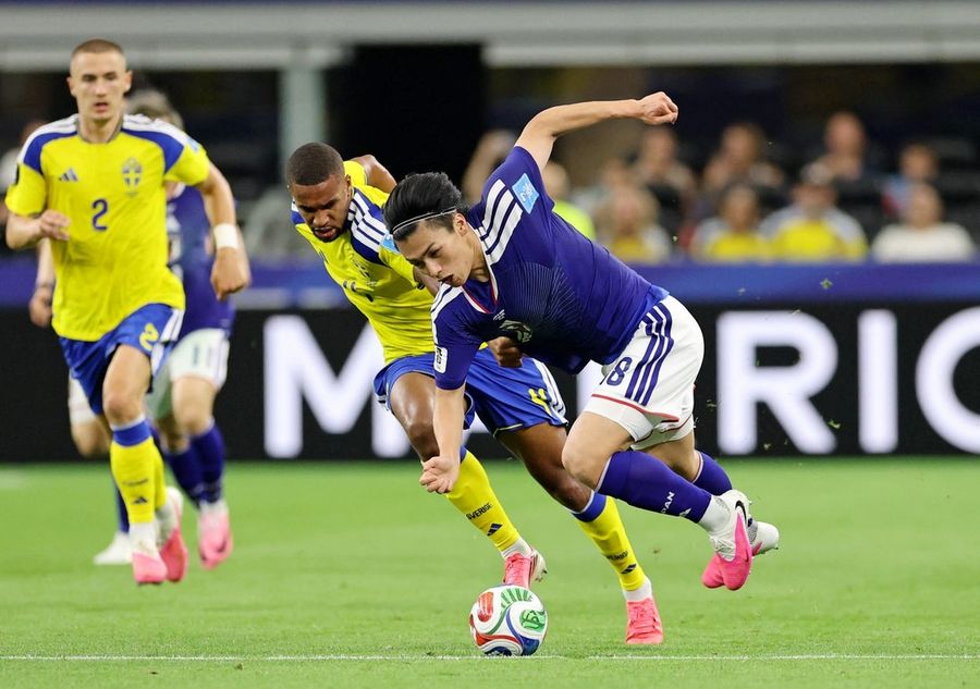 Sweden's Isak Hien helped off field with injury vs. Japan