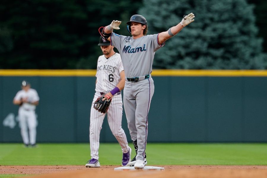 Marlins rout Rockies with offensive explosion