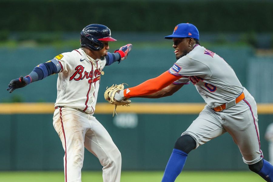 Five late runs just enough for Mets to beat Braves in 10
