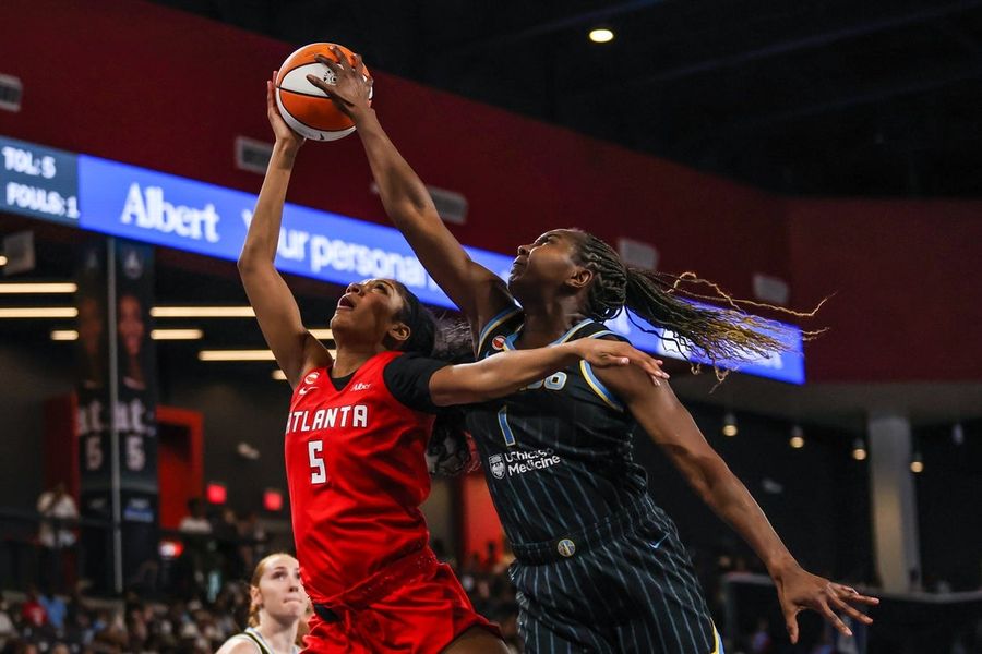 Angel Reese exits Dream's win after injuring leg