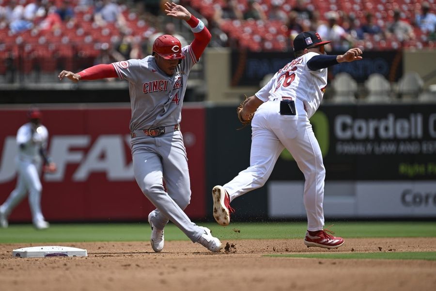 Reds push across three runs in 10th to knock off Cardinals