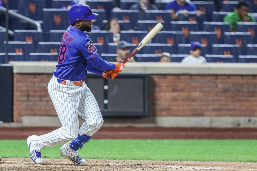 A rebatida decisiva de Luis Robert Jr. garante a vitória dos Mets sobre os Marlins.