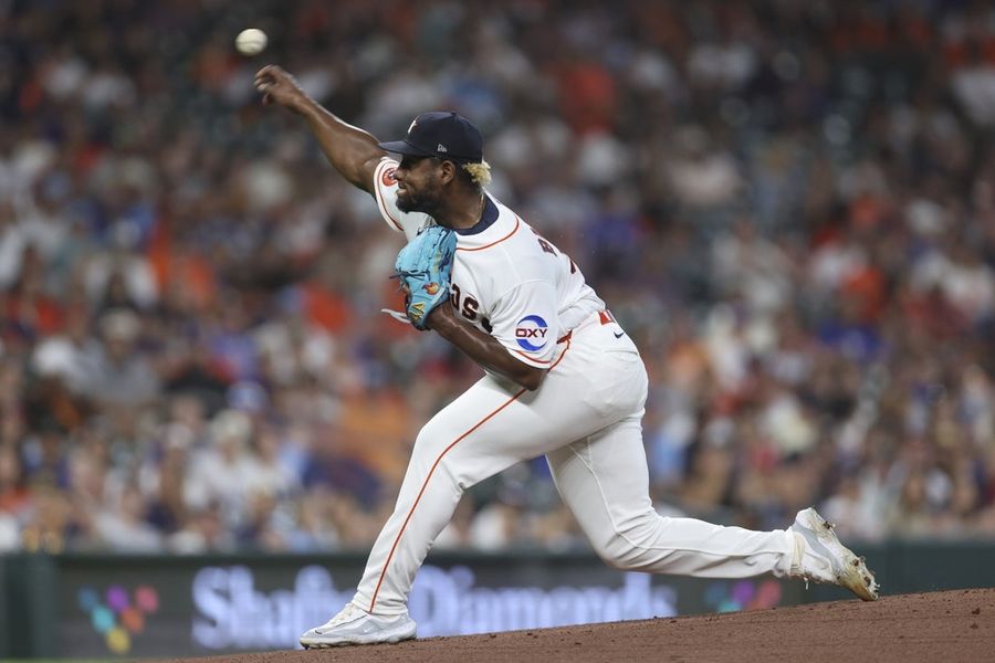 Astros cling to 1-run lead, hold off Rangers in division tilt