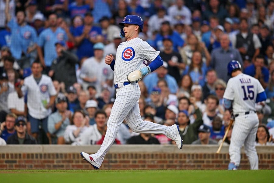 Surging Cubs score runs in late innings, deal loss to Yankees