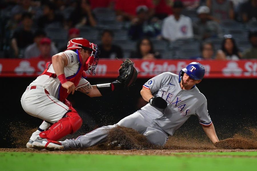 Rangers keep pace in AL West race, sink Angels in 10