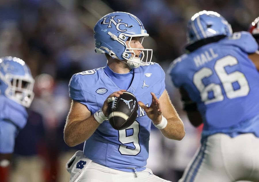 Syracuse converts 4th-down TD, two-point try to stun UNC in OT