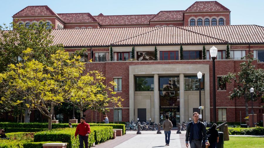 College players sue to be classified as school employees