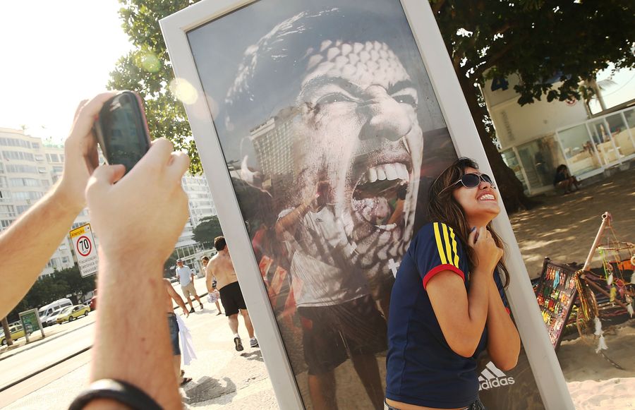 People In Rio Are Doing Funny Things With A Luis Suárez Billboard