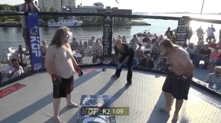 MMA Fighter Loses After Barfing All Over The Cage