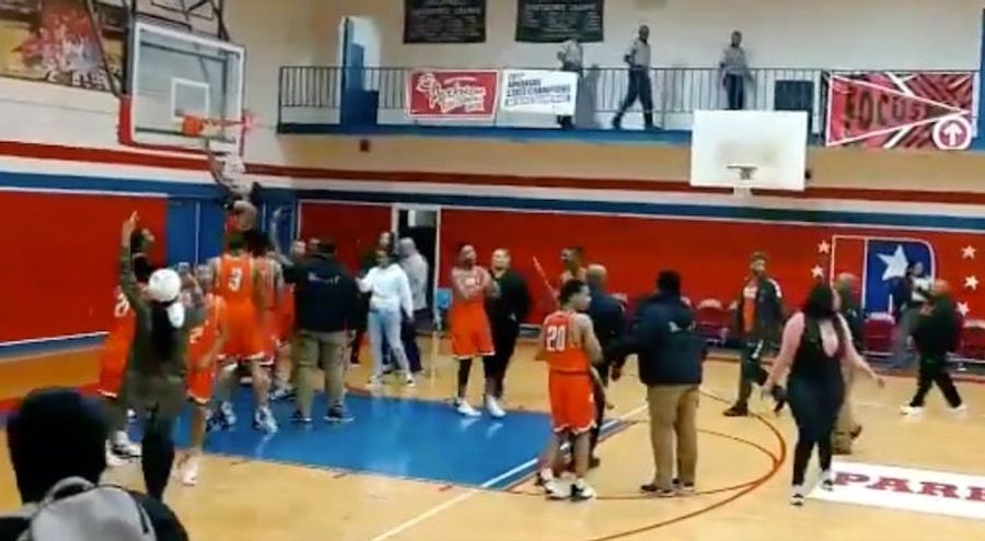 High School Basketball Team Enters Taunting Hall Of Fame After Cutting Down Net On Rival's Home Court