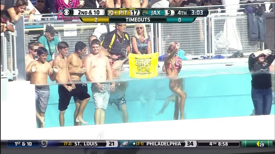 EverBank Field Pool Features Woman Wearing Jeans &amp; A Sweatshirt