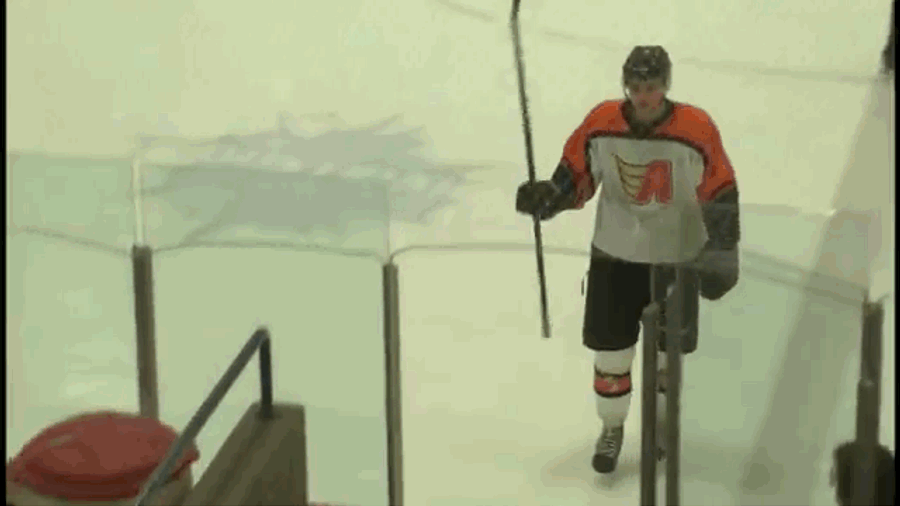 Hockey Player Attempts Dramatic Exit, Nearly Decapitates Himself
