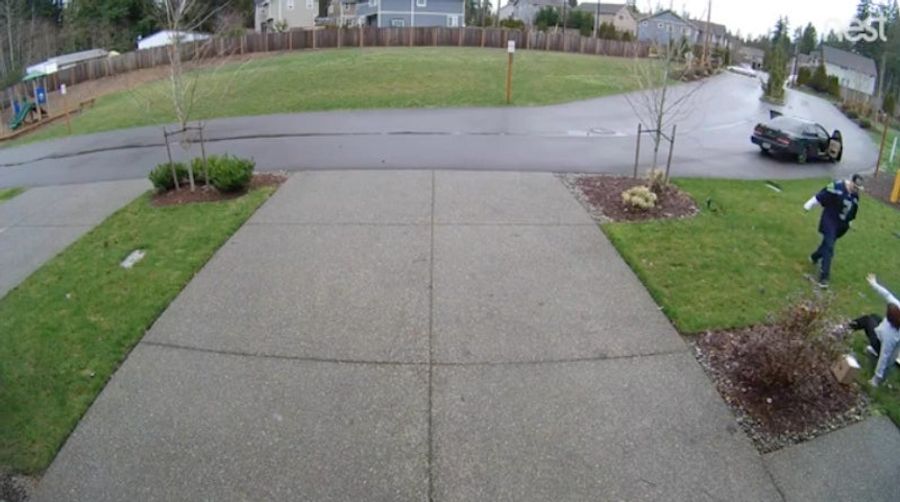 Bumbling Package Thief Injures Leg, Is Rescued By Getaway Driver In Russell Wilson Jersey<em></em>