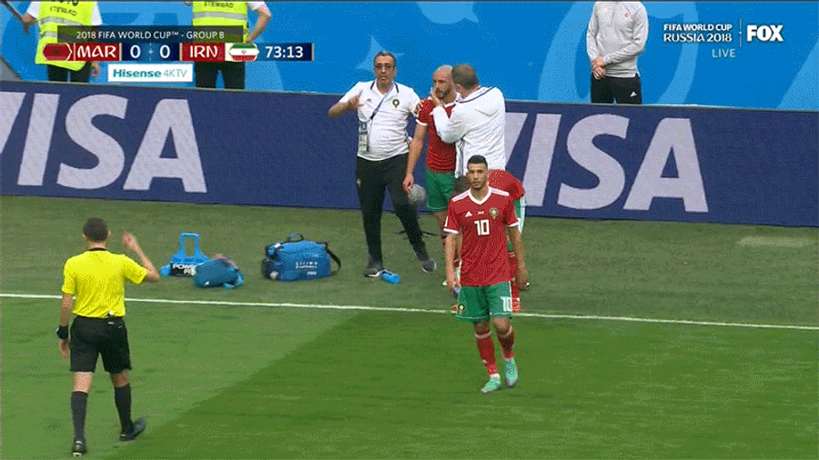 Morocco Player Physically Restrained From Re-Entering Game After Bashing Head Against The Ground