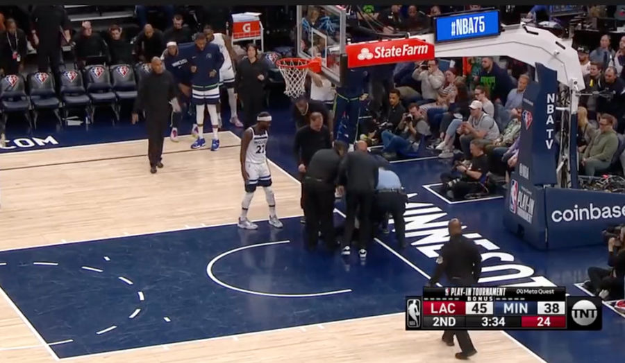 Women tries, fails to glue herself to NBA floor