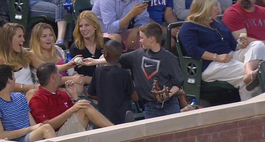 Boy Pulls Off The Smoothest Foul Ball Trick To Impress Girl Behind Him