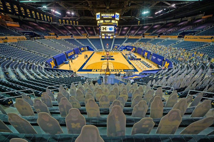 Repeated COVID outbreaks won't stop Michigan from lusting after NCAA Tournament cash