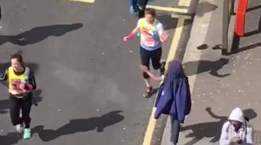 Kid Pretends To High-Five Marathoners, But They Are All Too Slow