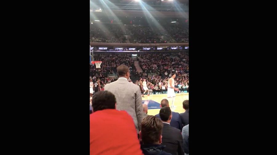 Guy At Knicks Game Unwisely Tries To Get Team Staffer To Sit Down By Tugging On His Coat