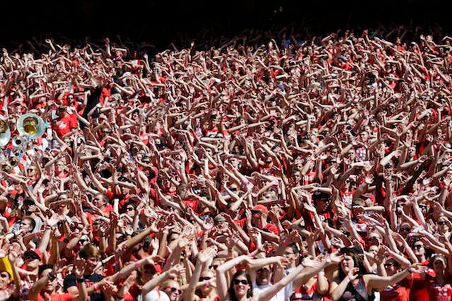 Police: Drunk Nebraska Fan Tried To Jump Over Taxi, Failed