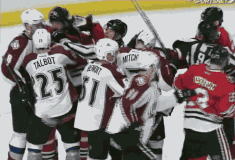 Official Punched In Face During Scuffle In Avalanche-Blackhawks Game