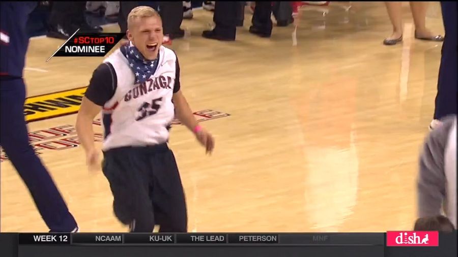 Half-Court Shot Bounces Off Top Of Backboard, Goes In