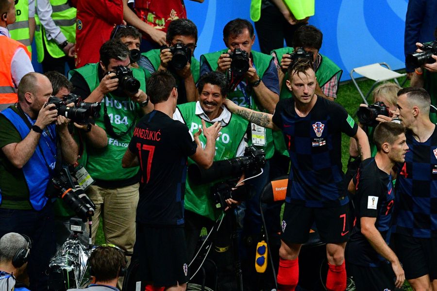 Photographer Tackled By Celebrating Croatian Players Got Incredible Photos, Kisses