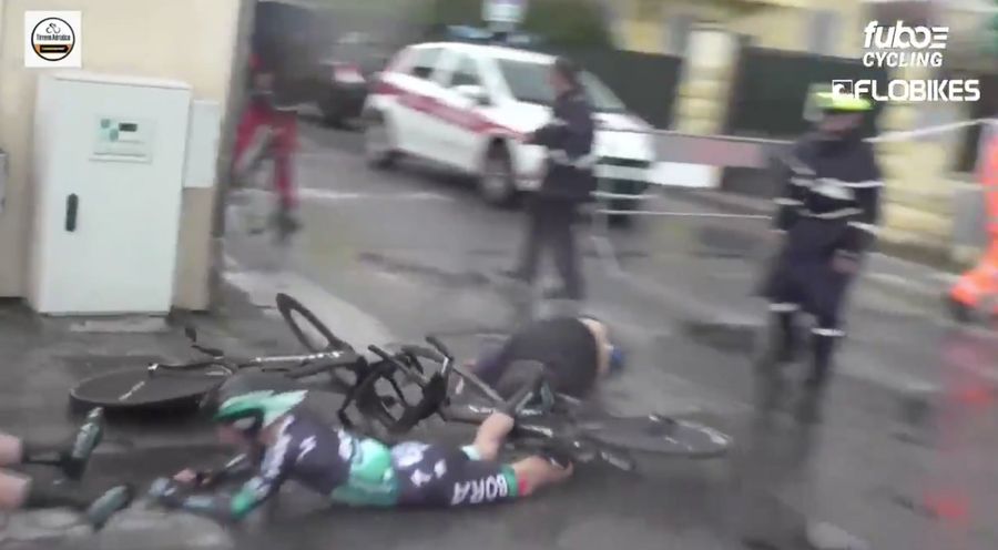 Dumbass Causes Gnarly Bike Crash By Just Walking Into The Middle Of A Race