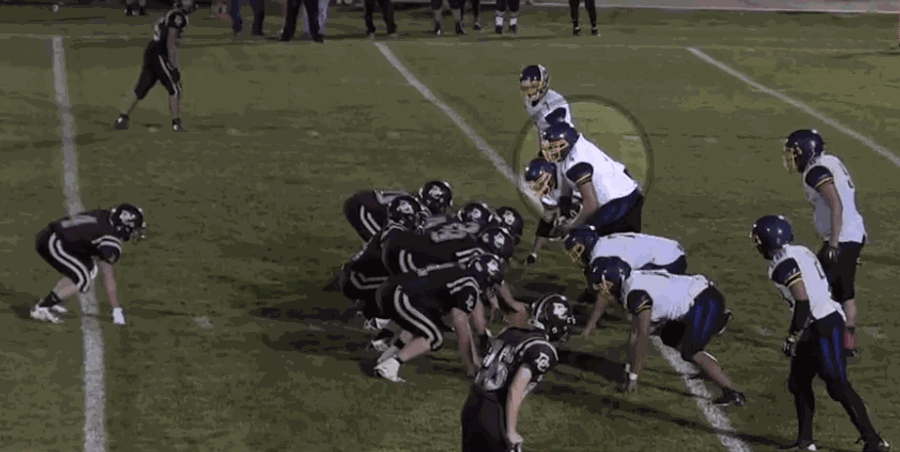 Watch A Giant High School Football Player Dominate His Tiny Opponents