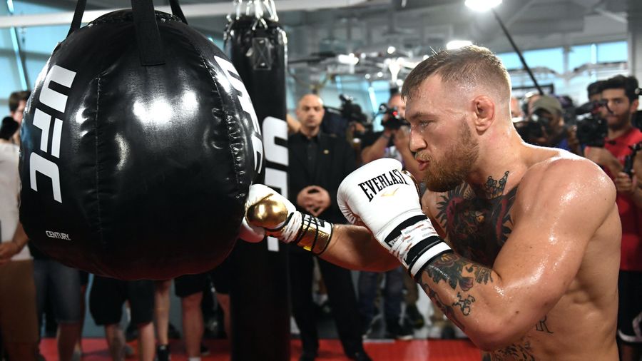 Here&#39;s Conor McGregor Knocking Down A Slice Of Pizza Wearing A Wig