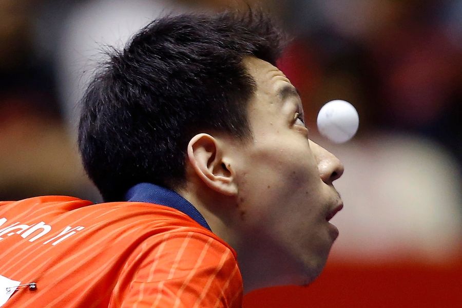 Ping Pong Players Staring At Balls