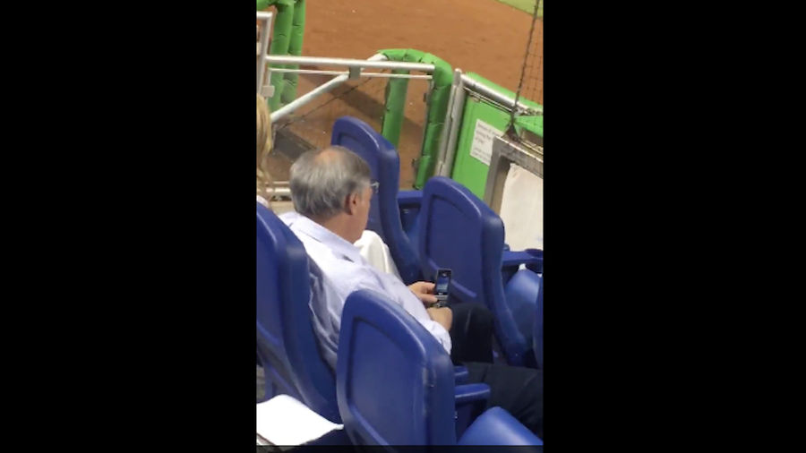 Jeffrey Loria Uses A Flip Phone