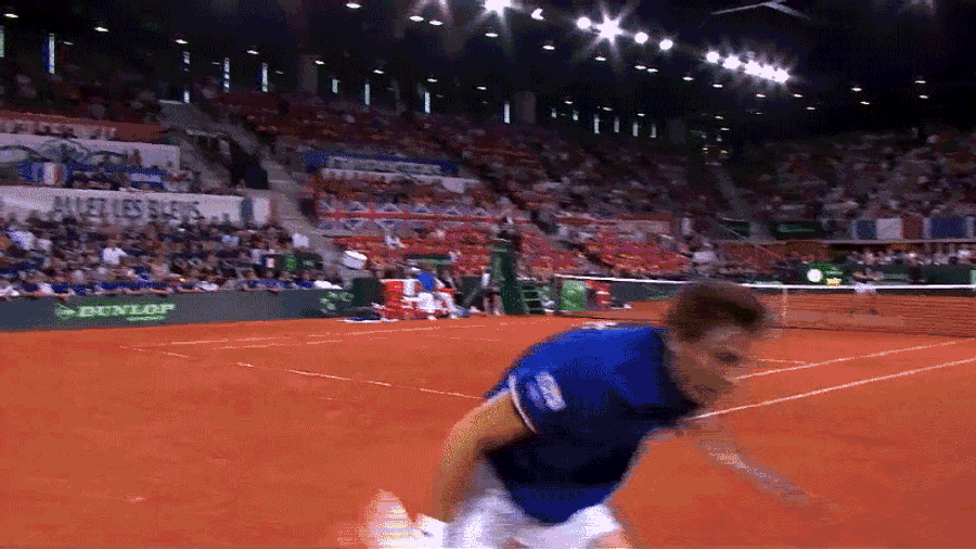 Tennis Player Hurtles Into The Stands, Hits The Ball Back Into Play