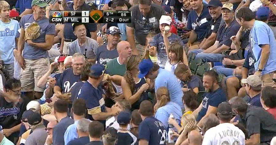 One Triumphant Little Girl Emerges Out Of A Foul Ball Frenzy