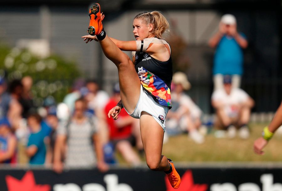 Australian Rules Footballer Receives Nasty Comments, Then Support, Over Photo Of Her Kicking