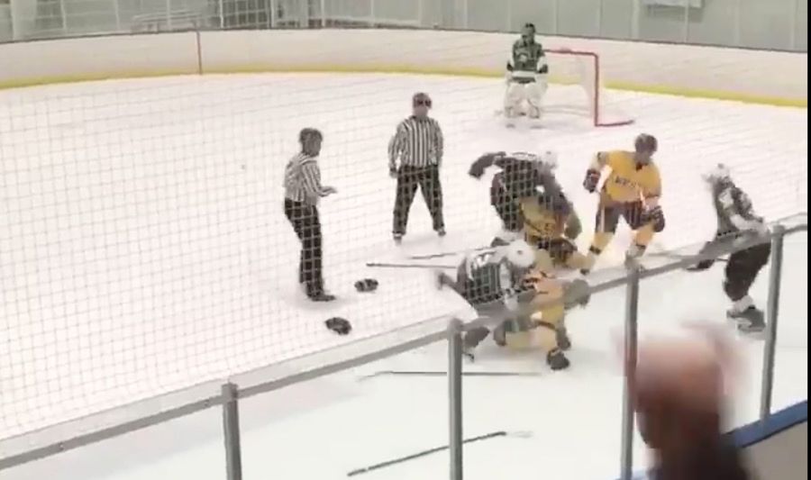 &quot;Fuck Him Up,&quot; Spectators Cheer As Two High School Hockey Teams Brawl