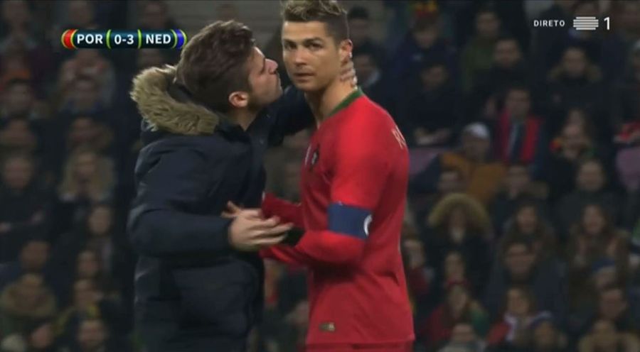 Four Idiots On The Field Invade Portugal Match; One Tries To Kiss Cristiano Ronaldo