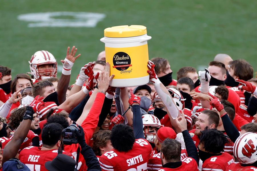 Wisconsin’s QB didn’t drop the Mayo Bowl trophy, the cheap-ass thing broke in his hand