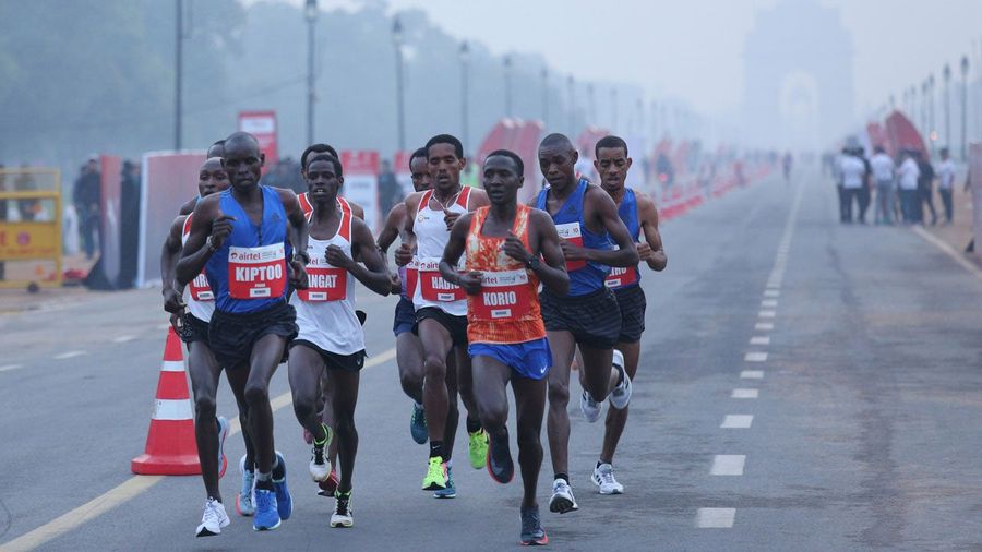 Runners Compete In Delhi Half Marathon Amid Heavy Pollution