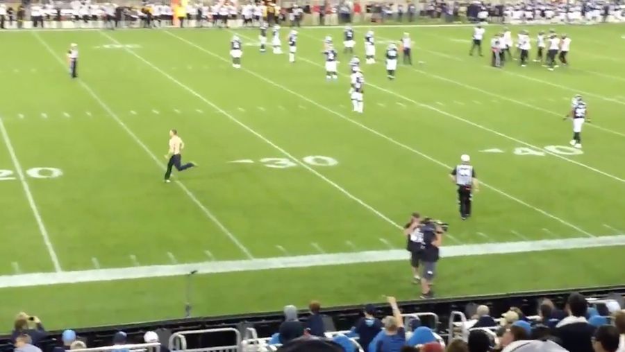 Idiot On The Field Runs Around CFL Game, Gets Decked By Player
