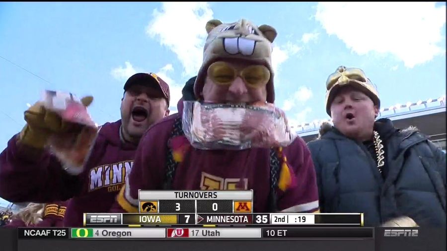Minnesota Fan Just Chewin' On Some Raw Bacon, Still In The Package