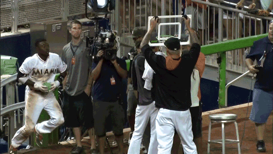 Dee Gordon Dunks On Christian Yelich During Post-Game Interview