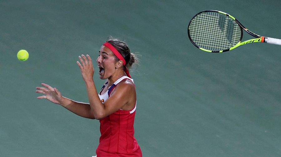 Mónica Puig Stuns Angelique Kerber To Win Puerto Rico's First-Ever Gold Medal<em></em>