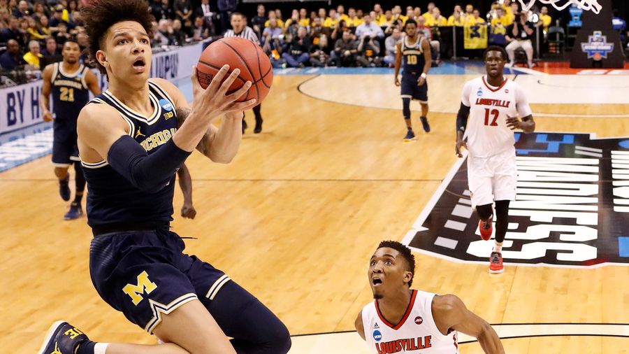 Michigan Upsets No. 2 Louisville For Sweet Sixteen Spot