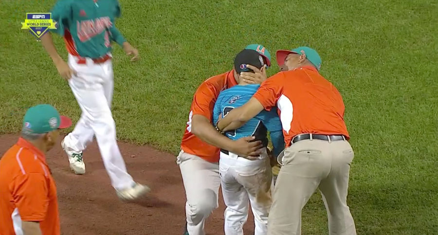 Opposing Coaches And Players Console Little League Pitcher After Walk-Off