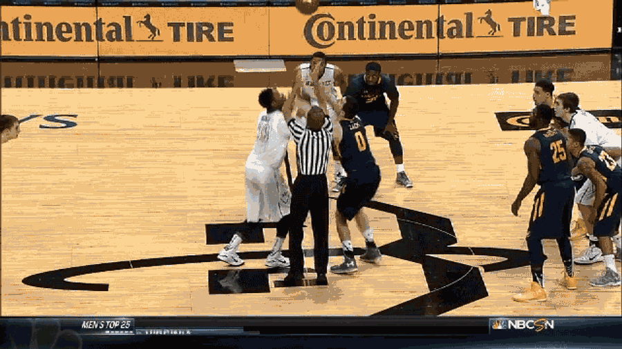 Basketball Referee Collapses After Tossing Opening Tip, Carted Off