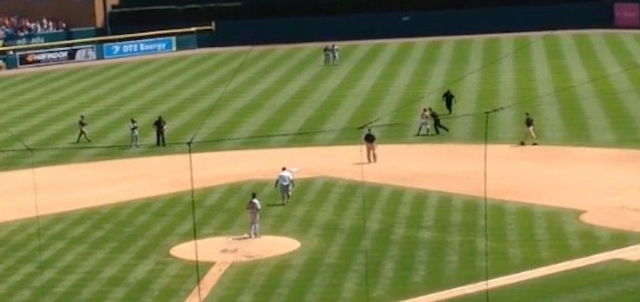 Idiot On The Field Evades One Security Guard, Gets Planted By Another